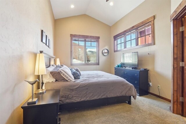 0050 County Road 1293 Unit B, Silverthorne, CO 80498 - carpeted bedroom with lofted ceiling, baseboards, and recessed lighting