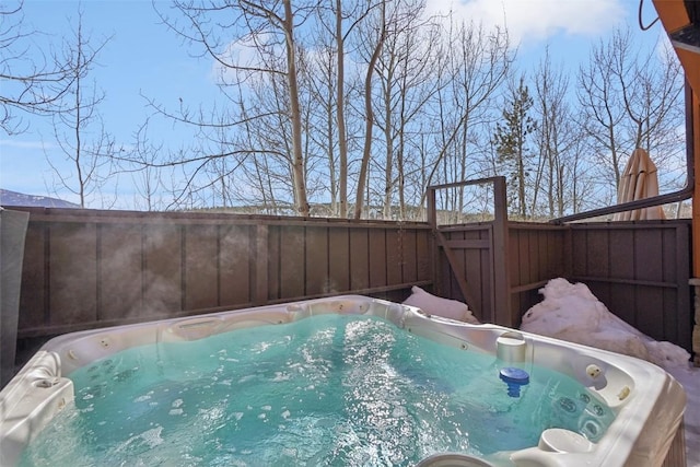 0050 County Road 1293 Unit B, Silverthorne, CO 80498 - view of swimming pool with a hot tub and a fenced backyard