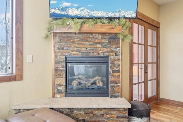 0050 County Road 1293 Unit B, Silverthorne, CO 80498 - interior details with a fireplace, wood finished floors, and baseboards