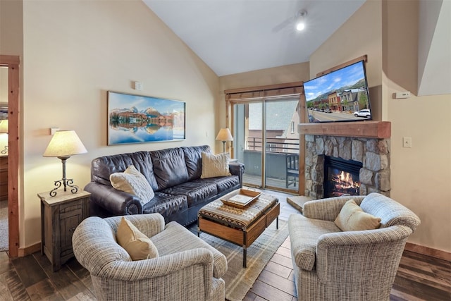 living area with a fireplace, wood finished floors, baseboards, and high vaulted ceiling