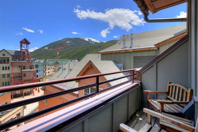 balcony featuring a mountain view