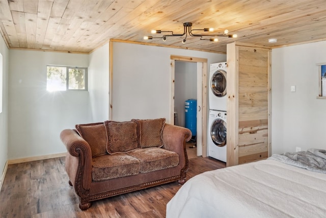 bedroom with a chandelier, stacked washer and clothes dryer, wood ceiling, and wood finished floors