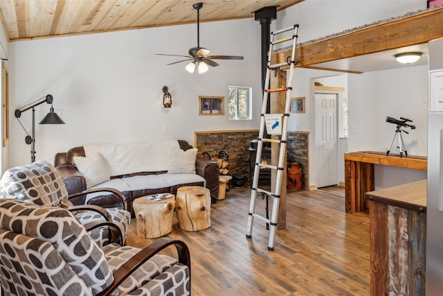 living room with wood ceiling, wood finished floors, a ceiling fan, crown molding, and vaulted ceiling