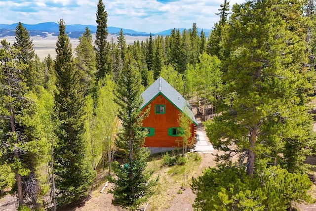 433 Fremont Knoll Ln, Jefferson, CO 80456 - view from above of property featuring a mountainous background and a heavily wooded area
