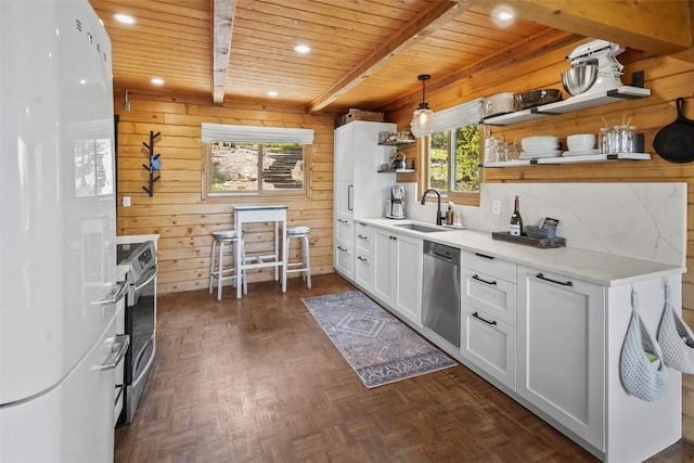 433 Fremont Knoll Ln, Jefferson, CO 80456 - kitchen with freestanding refrigerator, a sink, open shelves, stainless steel dishwasher, and wooden ceiling