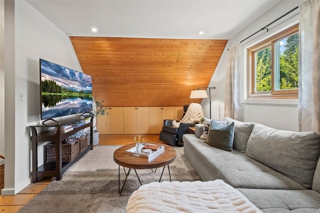 433 Fremont Knoll Ln, Jefferson, CO 80456 - living area featuring light wood-style floors, recessed lighting, lofted ceiling, wood walls, and baseboards