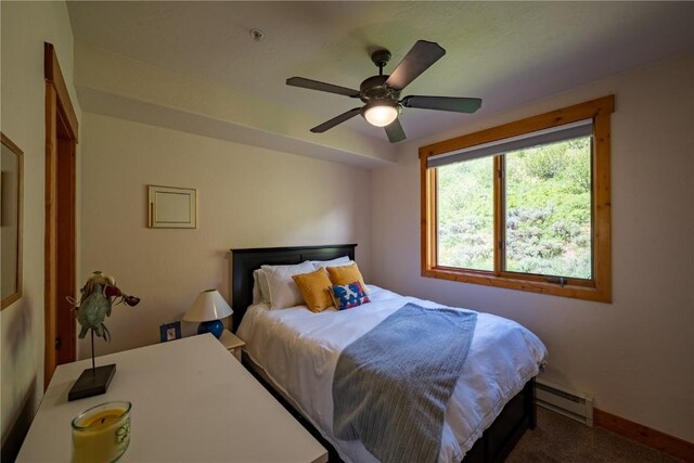580 Anglers Dr Unit 204, Steamboat Springs, CO 80487 - carpeted bedroom with baseboard heating, baseboards, and ceiling fan