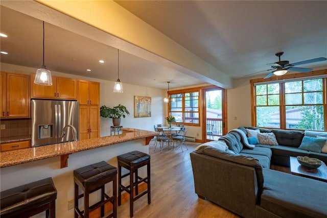 580 Anglers Dr Unit 204, Steamboat Springs, CO 80487 - living area featuring light wood-style flooring, recessed lighting, and a ceiling fan