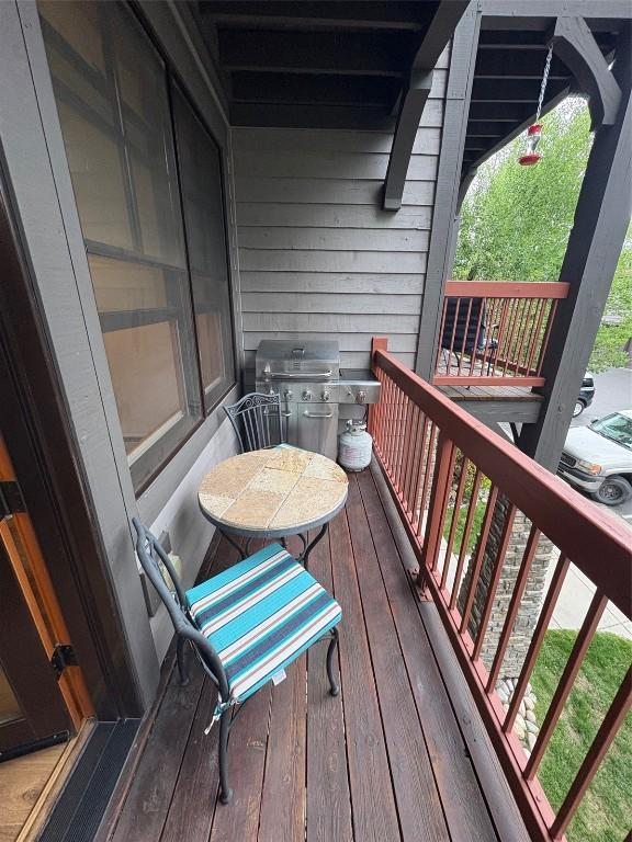 580 Anglers Dr Unit 204, Steamboat Springs, CO 80487 - wooden deck featuring a grill