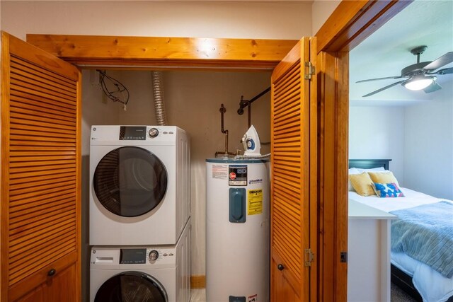 580 Anglers Dr Unit 204, Steamboat Springs, CO 80487 - laundry area featuring water heater, estacked washer and dryer, and ceiling fan