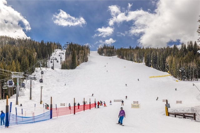 616 Montezuma Rd Unit C-1, Keystone, CO 80435 - snowy aerial view with a wooded view