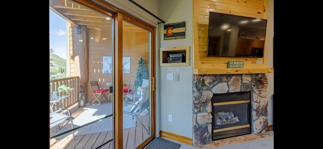 22714 US Highway 6 Unit 5989, Keystone, CO 80435 - doorway featuring baseboards and a fireplace