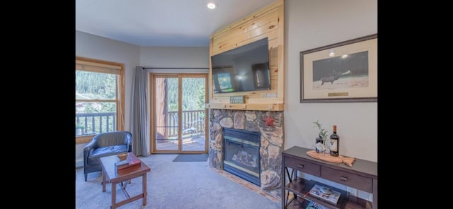 22714 US Highway 6 Unit 5989, Keystone, CO 80435 - living area featuring a stone fireplace, recessed lighting, and carpet flooring