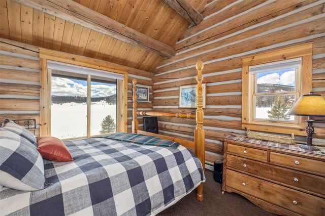 82 Potentilla Ln, Keystone, CO 80435 - bedroom with lofted ceiling with beams, log walls, access to outside, dark carpet, and wood ceiling