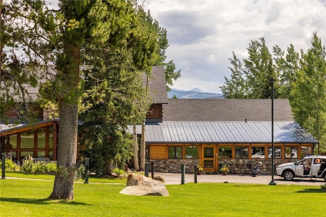 82 Potentilla Ln, Keystone, CO 80435 - exterior space featuring a lawn and stone siding