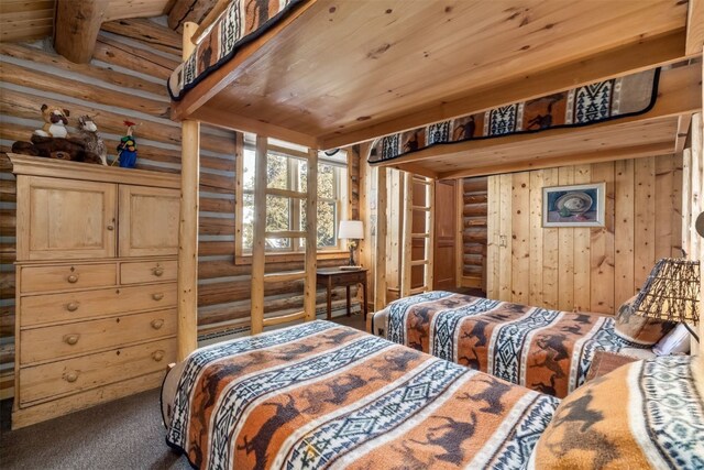 82 Potentilla Ln, Keystone, CO 80435 - carpeted bedroom featuring wood ceiling and log walls