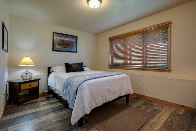 631 Parkview Dr, Steamboat Springs, CO 80487 - bedroom featuring wood finished floors and baseboards