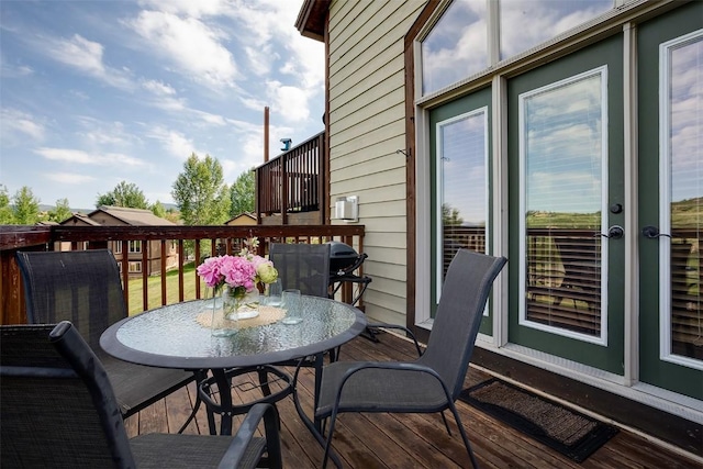 631 Parkview Dr, Steamboat Springs, CO 80487 - wooden deck with outdoor dining space
