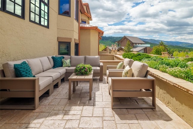 2600 Eagleridge Dr Unit 26, Steamboat Springs, CO 80487 - view of patio / terrace with a mountain view, outdoor lounge area, and a balcony