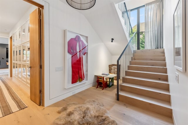 628 Independence Rd, Keystone, CO 80435 - staircase with wood finished floors and lofted ceiling
