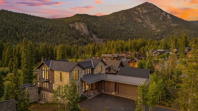 628 Independence Rd, Keystone, CO 80435 - view of mountain background with a heavily wooded area