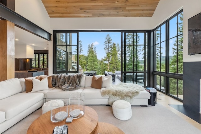 628 Independence Rd, Keystone, CO 80435 - living area featuring wood ceiling, plenty of natural light, and high vaulted ceiling