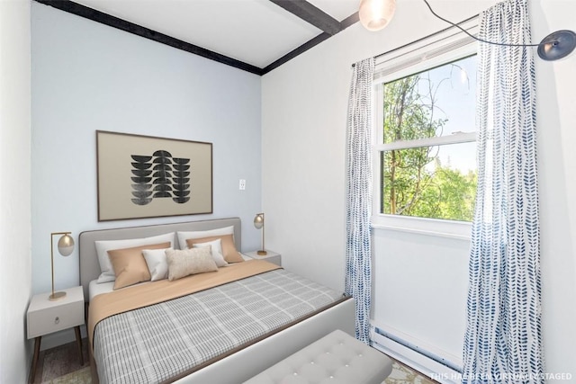 8011 Ryan Gulch Rd Unit B2, Silverthorne, CO 80498 - bedroom featuring a baseboard heating unit and crown molding
