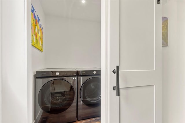 581 Fairview Blvd, Breckenridge, CO 80424 - laundry area with washer and dryer and wood finished floors