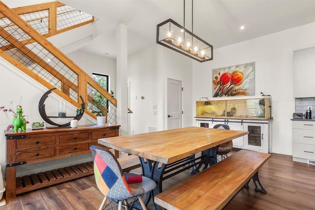 581 Fairview Blvd, Breckenridge, CO 80424 - dining space with wood finished floors, stairs, a chandelier, recessed lighting, and baseboards