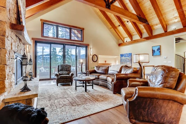 103 Victory Ln, Breckenridge, CO 80424 - living room with wood finished floors, beam ceiling, and high vaulted ceiling