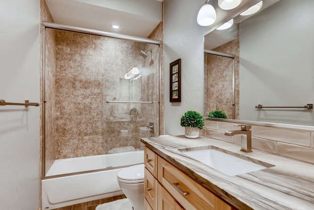 103 Victory Ln, Breckenridge, CO 80424 - full bath with toilet, vanity, and shower / bath combination with glass door