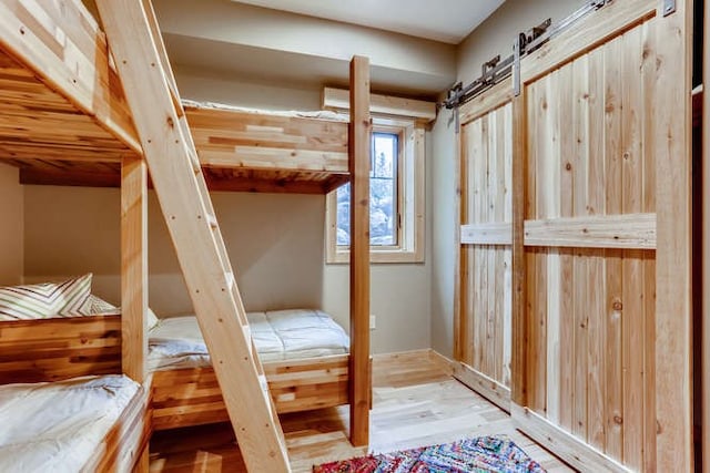 103 Victory Ln, Breckenridge, CO 80424 - bedroom featuring wood finished floors