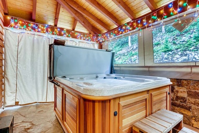 103 Victory Ln, Breckenridge, CO 80424 - sunroom featuring beam ceiling, french doors, and a hot tub