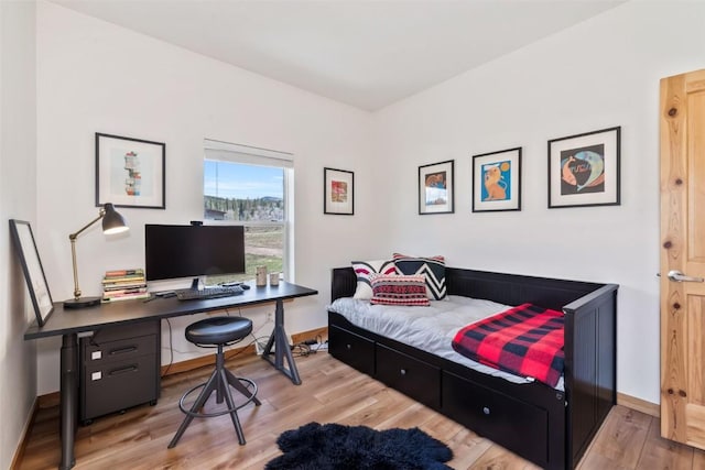 32404 Ute Trl, Oak Creek, CO 80467 - bedroom featuring baseboards and wood finished floors