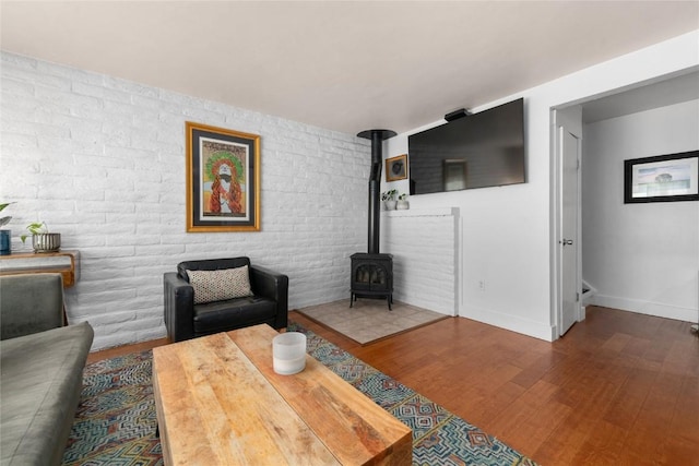 4 Sequoia Ct, Steamboat Springs, CO 80487 - living area featuring a wood stove and wood finished floors