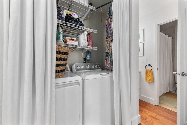 4 Sequoia Ct, Steamboat Springs, CO 80487 - laundry area featuring washer and dryer and light wood-type flooring