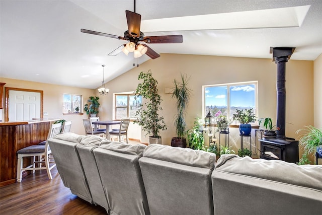 526 Sharps Way, Como, CO 80456 - living room with a wood stove, dark wood-type flooring, healthy amount of natural light, ceiling fan, and lofted ceiling
