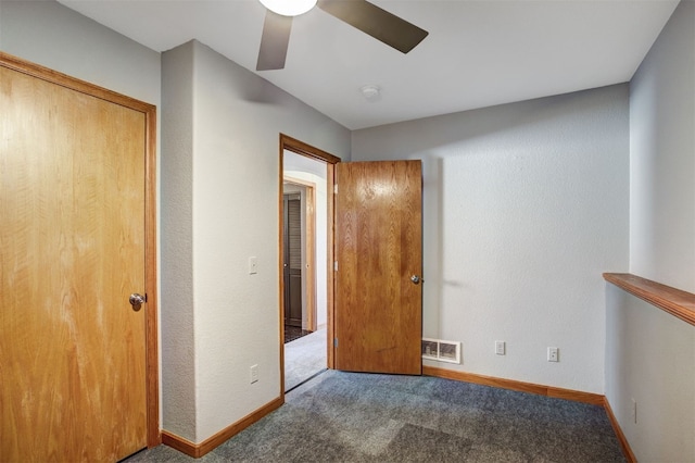 526 Sharps Way, Como, CO 80456 - unfurnished bedroom with carpet floors, a ceiling fan, and baseboards
