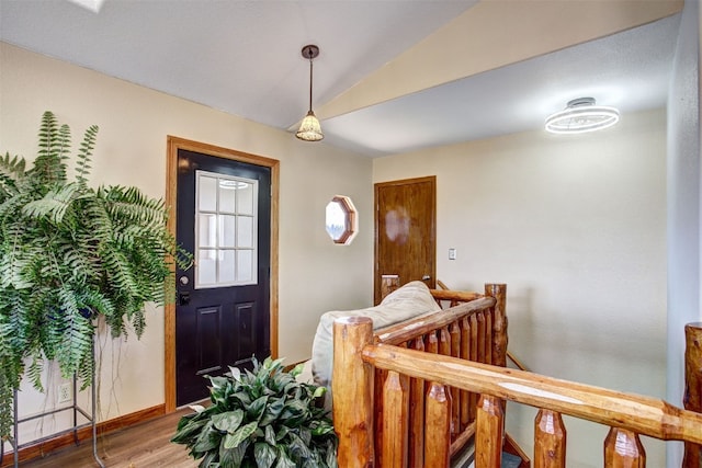 526 Sharps Way, Como, CO 80456 - entryway featuring wood finished floors, vaulted ceiling, and baseboards