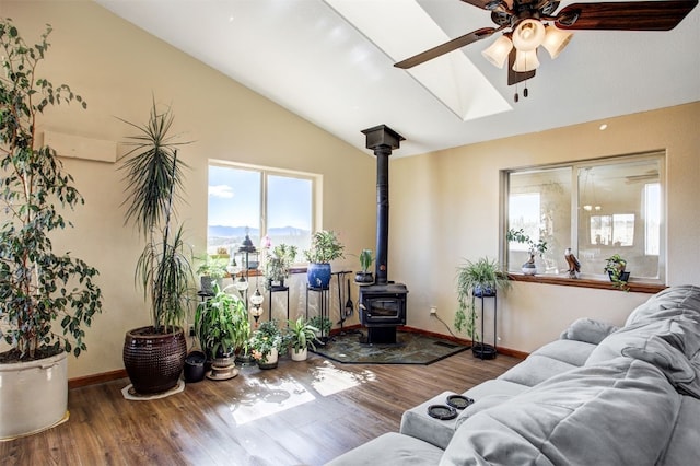 526 Sharps Way, Como, CO 80456 - living room featuring ceiling fan, lofted ceiling, plenty of natural light, and wood finished floors