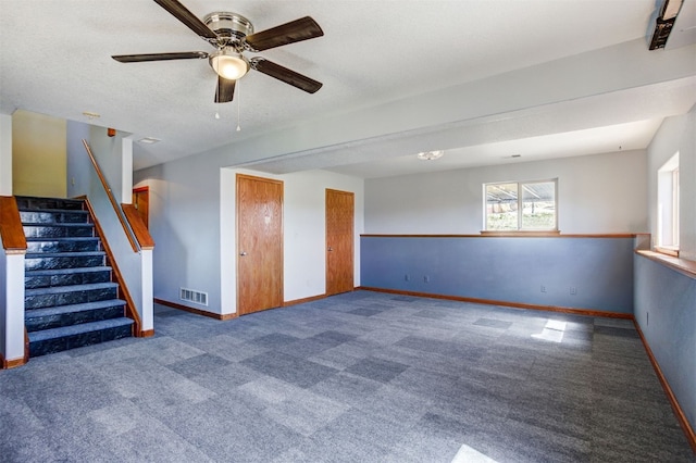 526 Sharps Way, Como, CO 80456 - carpeted empty room with baseboards, ceiling fan, and stairway