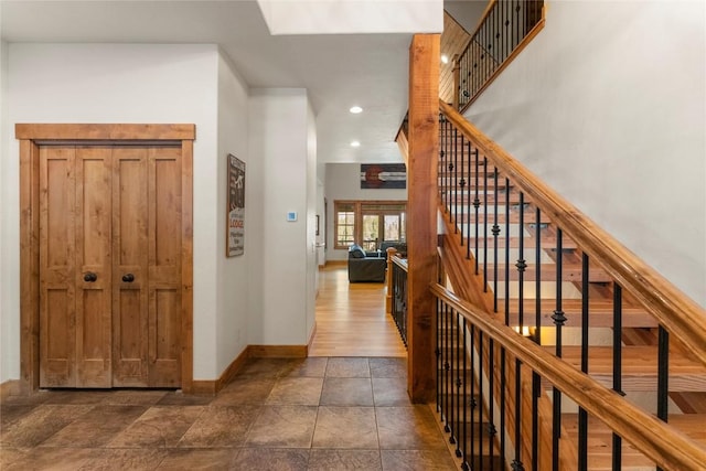 50 Cooney Ct, Blue River, CO 80424 - hall with recessed lighting, stairway, and dark stone finish flooring