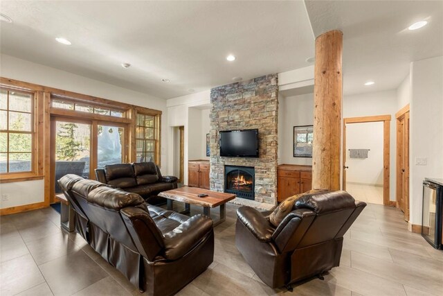 50 Cooney Ct, Blue River, CO 80424 - living area featuring recessed lighting, a fireplace, light tile patterned floors, and beverage cooler