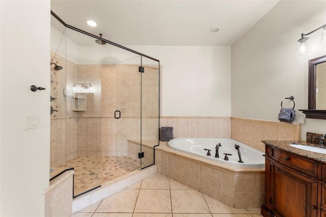 50 Cooney Ct, Blue River, CO 80424 - bathroom featuring vanity, a bath, a shower stall, and tile patterned flooring