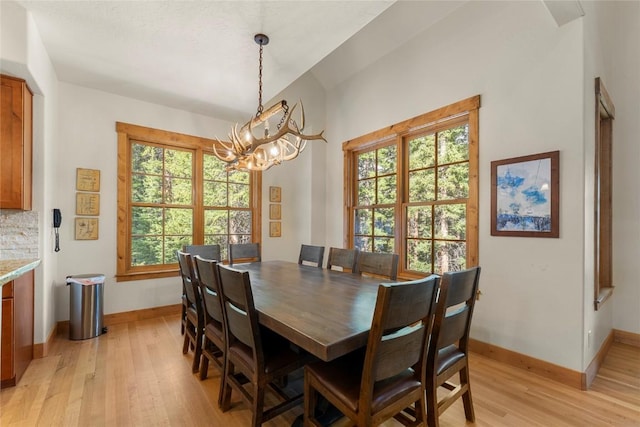 50 Cooney Ct, Blue River, CO 80424 - dining room featuring light wood finished floors and a chandelier