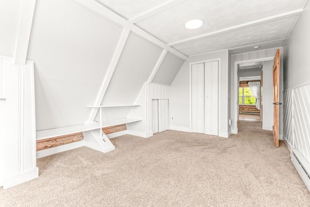 30955 Whitecotton Ct, Steamboat Springs, CO 80487 - bonus room with carpet flooring, a baseboard radiator, and vaulted ceiling