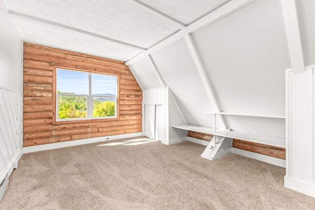 30955 Whitecotton Ct, Steamboat Springs, CO 80487 - bonus room with lofted ceiling, carpet floors, and log walls