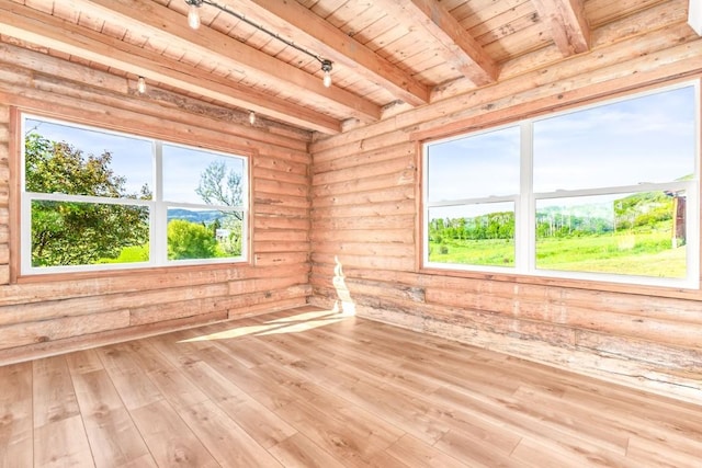 30955 Whitecotton Ct, Steamboat Springs, CO 80487 - unfurnished room with wood ceiling with exposed beams, healthy amount of natural light, hardwood / wood-style flooring, and rail lighting