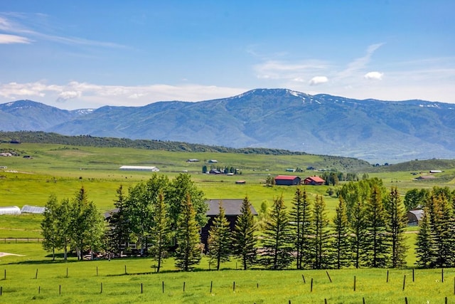 30955 Whitecotton Ct, Steamboat Springs, CO 80487 - mountain view with rural landscape and a pastoral area