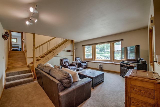 277 G Rd, Silverthorne, CO 80498 - carpeted living area with stairs and track lighting